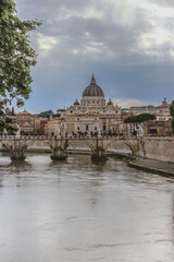 St. Peter's Basilica and Ponte Sant'Angelo over Tiber River in Rome, Italy
