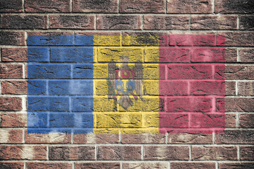 Moldova flag on old brick wall background