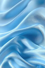Obraz premium Light blue silk fabric draped in flowing, wavy folds