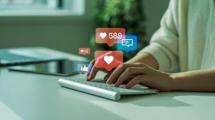 Person typing on keyboard with social media notifications appearing above likes comments