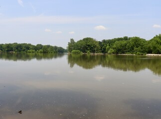 The peaceful river in the country on a sunny day.