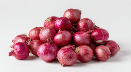 A pile of small, purplish-red onions