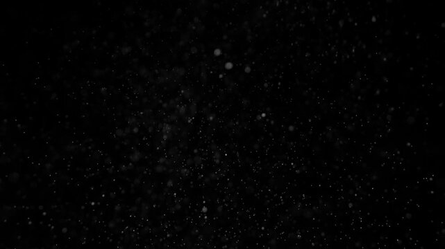 Super slow motion of realistic rain shower on black background . Filmed on high speed cinema camera at1000 fps