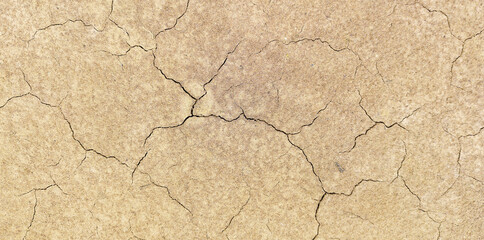 The ground has cracks in the top view for the background