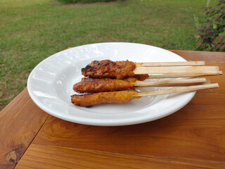 Sate lilit, sate pusut, sate kelapa, is a satay variant in Indonesia, originating from Balinese and...