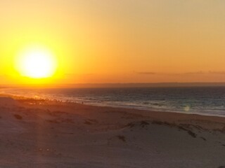 Egyptian beach under a dramatic sunset sky