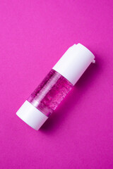 Pink Gel Bottle Product Photography: Vibrant Cosmetic Packaging on Magenta Background