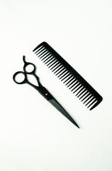 Sleek Black Hairdressing Scissors and Comb: Professional Styling Tools