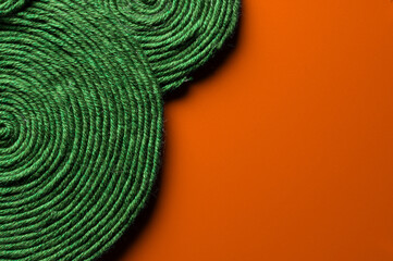 Close-up of natural cotton rope woven into a pattern. Details of threads and fibers, macro photography
