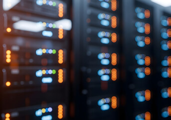 Blurred view of server racks with glowing lights in a data center