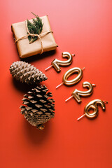 Decorative Elements for New Year's Celebration Featuring Gifts and Pine Cones