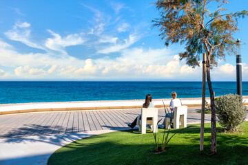 Altea, modern coastal promenade with seating area, trees, sea view and peaceful atmosphere