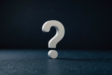 A single white question mark against a dark background