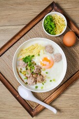 Congee or rice porridge with pork and eggs , thai food, asian food, chinese food