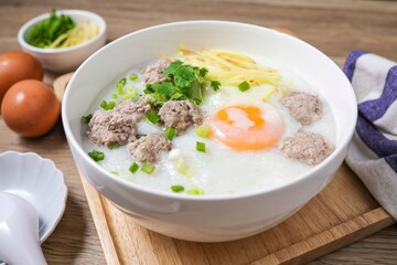 Congee or rice porridge with pork and eggs , thai food, asian food, chinese food