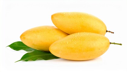Three ripe, golden mangoes rest on vibrant green leaves against a stark white background.