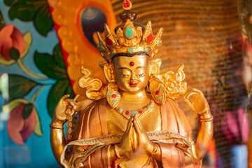 Goutama Buddha, Buddhist religious leader, being worshipped inside Okhrey Monastery - Sikkim , India. Image shot with permission.