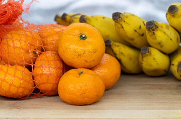 Fresh Citrus or tangerina and peeled fruit on white background,