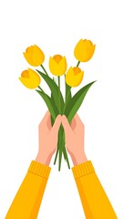 Hands holding a bouquet of yellow tulips