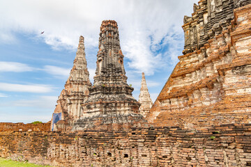 Detailed side perspective of the prang towers at Wat Chaiwatthanaram in Ayutthaya, Thailand with...
