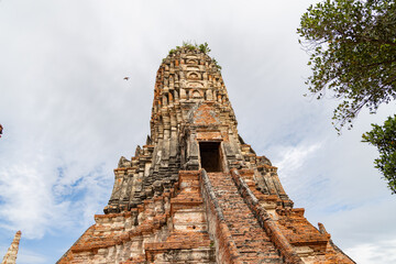 Main prang of Wat Chaiwatthanaram with steep staircase in Ayutthaya, Thailand