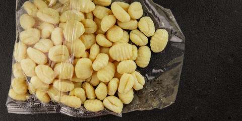 Gnocchi raw potato dough snack fresh delicious gourmet food background on the table  rustic food top view copy space vegetarian food
