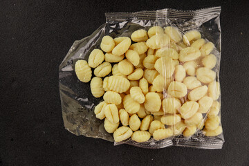 Gnocchi raw potato dough snack fresh delicious gourmet food background on the table  rustic food top view copy space vegetarian food