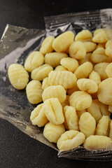 Gnocchi raw potato dough snack fresh delicious gourmet food background on the table  rustic food top view copy space vegetarian food