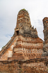 Close-up of the central prang and steps of Wat Chaiwatthanaram in Ayutthaya, Thailand showcasing detailed brickwork