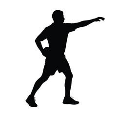 Silhouette of a man throwing a ball with one arm extended