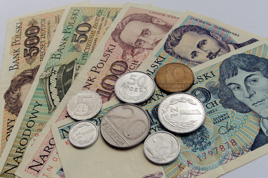 Old polish money, banknotes and coins  from 80s, 90s. on white background. Polish zloty