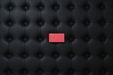 Naklejka premium Horizontal Red Rectangular Object on Black Buttoned Leather Texture rectangle centered