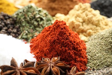 Many different spices as background, closeup view