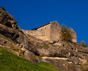 Fototapeta premium Ancient buildings and houses in Chufut Kale in Crimea.
