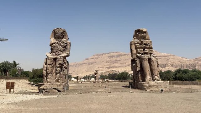 Colossi of memnon showing ancient egyptian pharaoh amenhotep iii