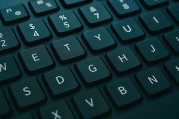 A close-up of a computer keyboard with keys labeled from A to Z
