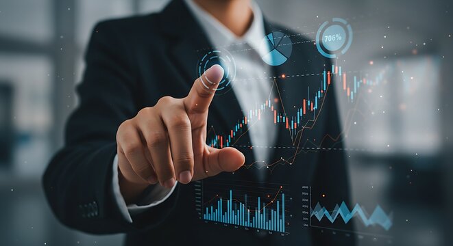 An innovative image of a business person managing financial data and charts on a touch-sensitive virtual screen.