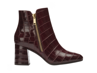Stylish burgundy crocodile embossed ankle boot with gold zipper isolated on transparent background