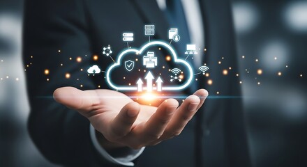 Businessman holding a glowing cloud icon with data icons and network connections hand