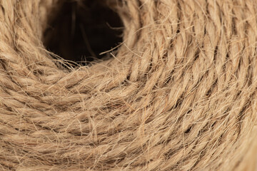 packing rope made of jute with a tied bow, isolate for clipping on a white background