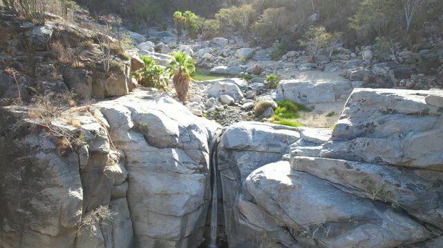 Aerial Footage of Hidden Waterfall Oasis at Ca&ntilde;&oacute;n de la Zorra, Oasis Landscape in BCS, Mexico