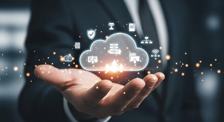 Businessman holding cloud computing technology with digital icons and glowing particles data network