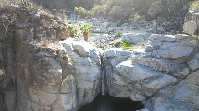 Aerial Footage of Hidden Waterfall Oasis at Ca&ntilde;&oacute;n de la Zorra, Oasis Landscape in BCS, Mexico