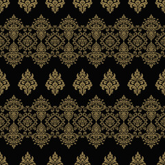 Elegant damask pattern in gold and black.