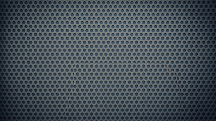 Dark gray perforated metal surface.
