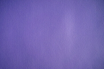 Solid purple background made of soft textiles.Felt background.