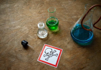 The symbol of the skull and crossbones.Toxic substances from the laboratory.A home...