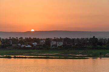 Sunset Over Luxor — Nile River and Hills at Golden Dusk in Ancient Thebes (Veset)