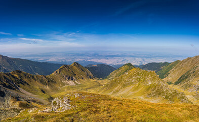 The breathtaking Fagaras Mountains of Romania. A stunning summer landscape as seen from the hiking trail near Balea Lake and the iconic Transfagarasan Road