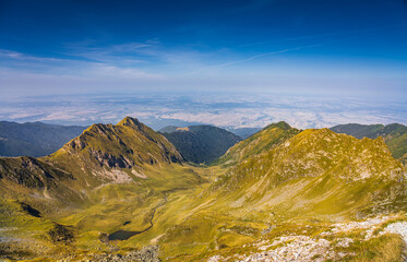 The breathtaking Fagaras Mountains of Romania. A stunning summer landscape as seen from the hiking trail near Balea Lake and the iconic Transfagarasan Road